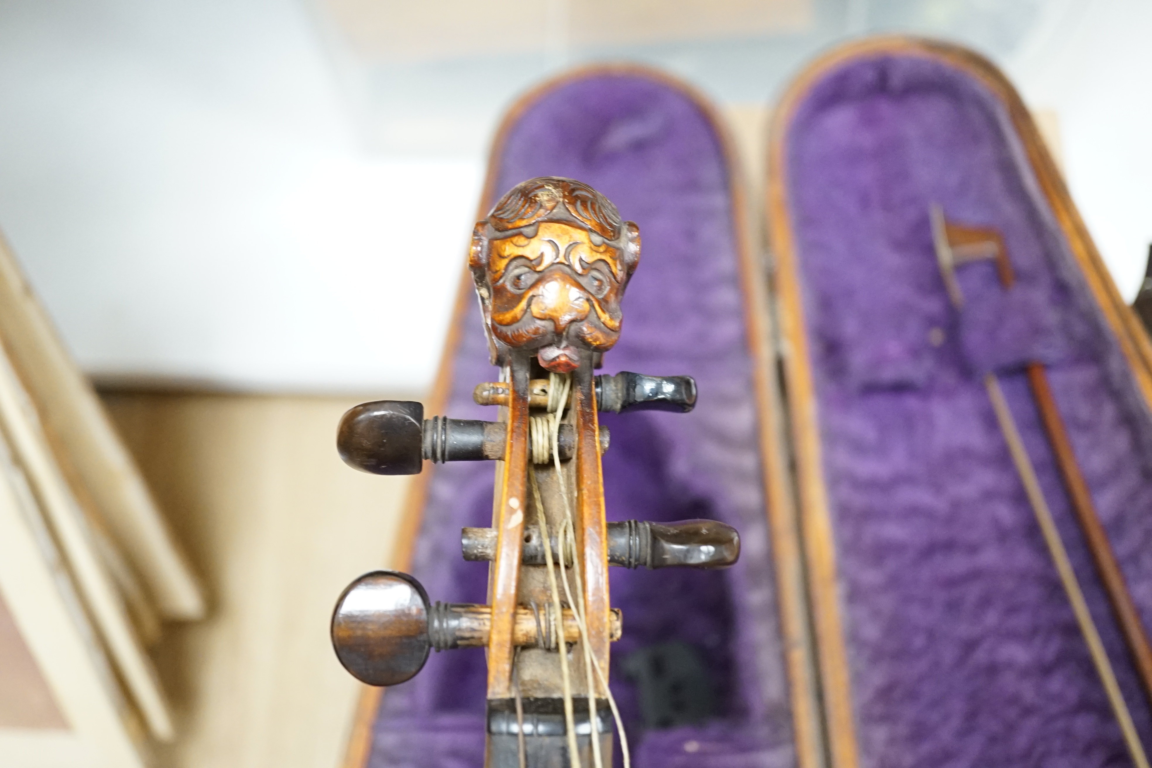 A 19th century violin (unlabelled), in mahogany Jerome case, with bow stamped Vuillaume